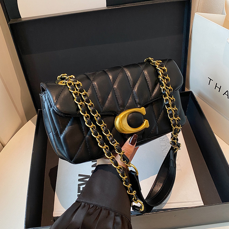 Dames gewatteerde leren schoud - Luxury Bags Logo recensie en prijs
