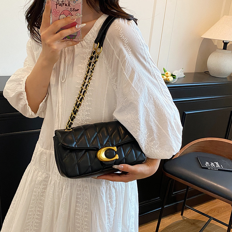 Dames gewatteerde leren schoud - Luxury Bags Logo recensie en prijs