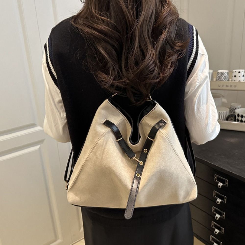 Trendy grote suède tas met vee - Bucket Bag Suede recensie en prijs