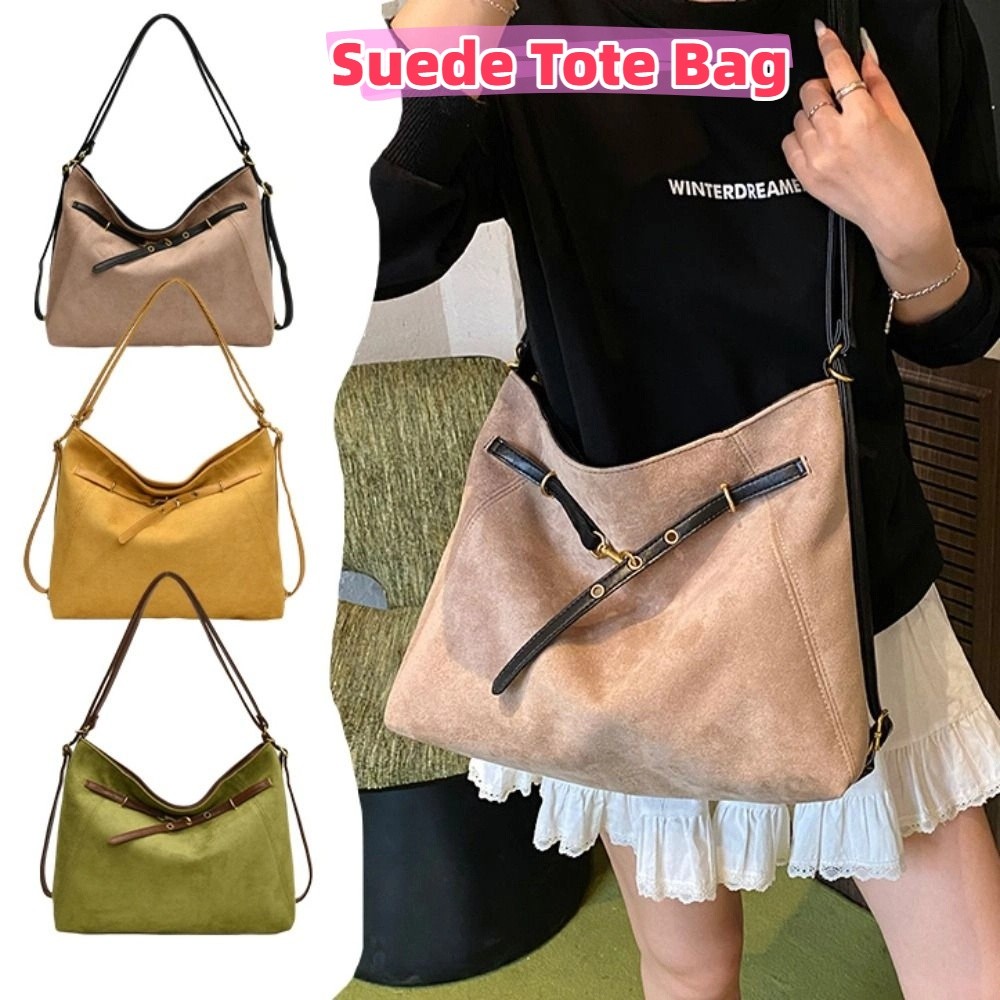 Trendy grote suède tas met vee - Bucket Bag Suede recensie en prijs