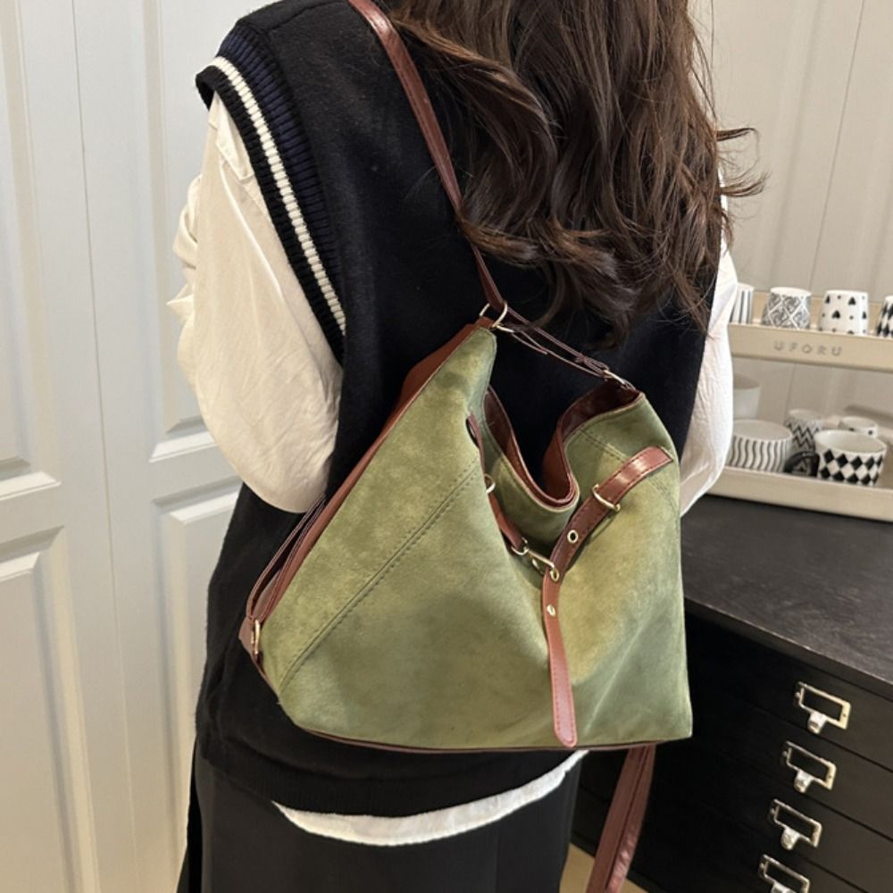Trendy grote suède tas met vee - Bucket Bag Suede recensie en prijs