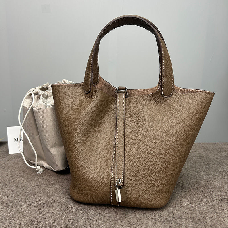 Damestas Emmertassen Vrouwelij - Bucket Bag Suede recensie en prijs